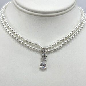 Swarovski Pearls Necklace With small delicate Flower pendant